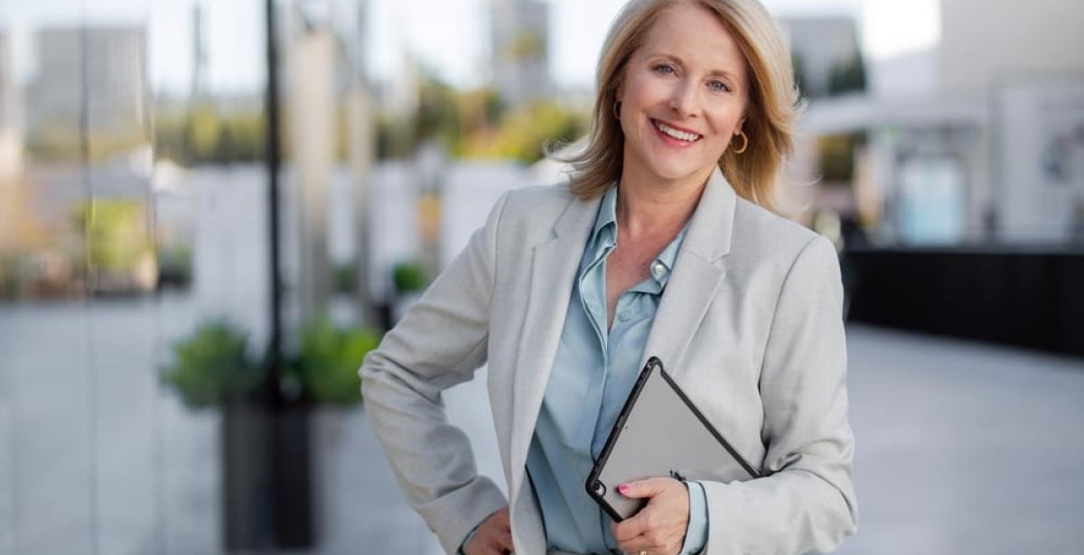 Business executive smiling at work