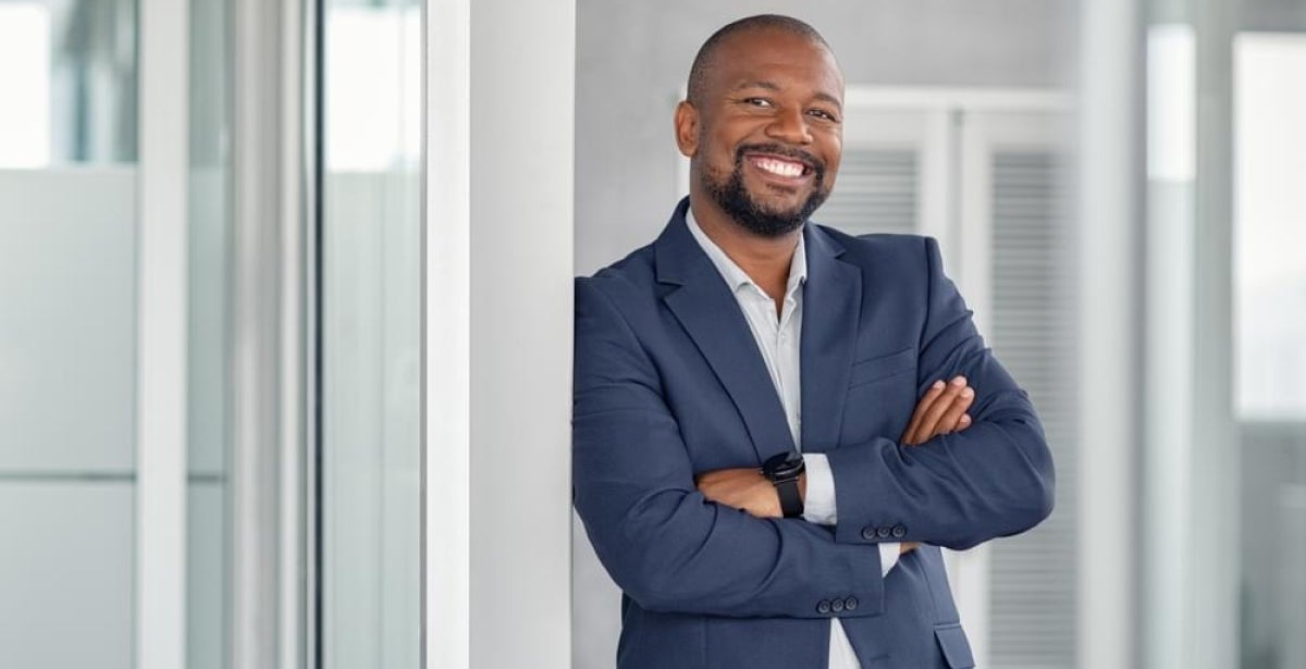 Business executive smiling at workplace