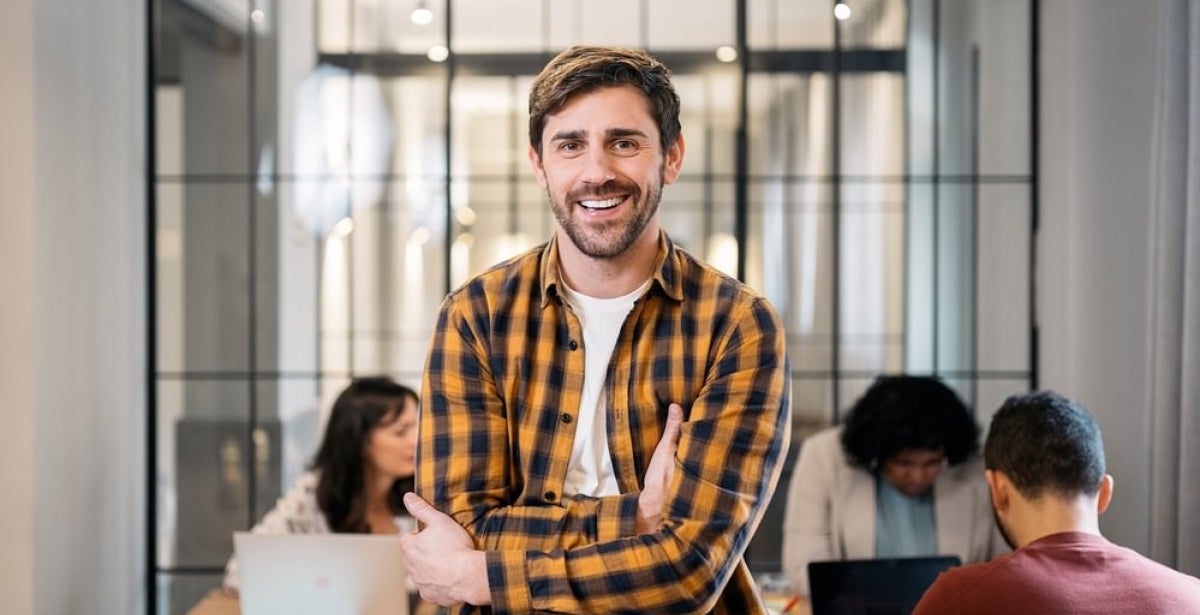 A PR practitioner smiling at workplace