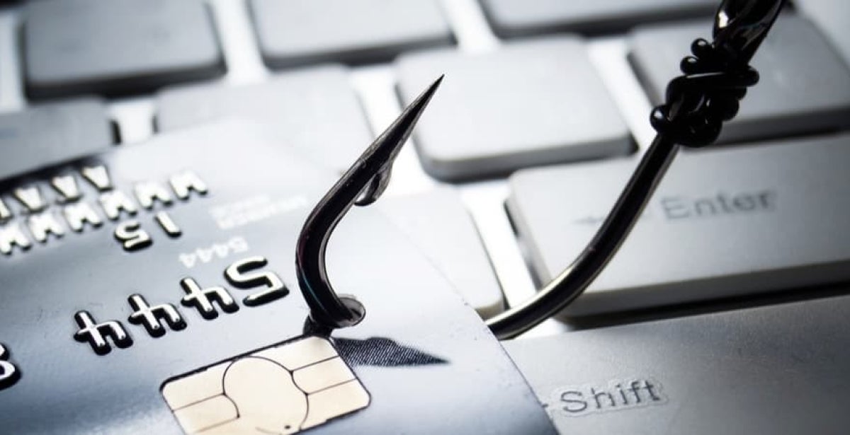 A hook phishing a credit card