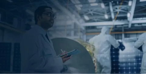 Blurred motion double exposure image of professionals with tablet and airplane model in modern industrial space with blue tones