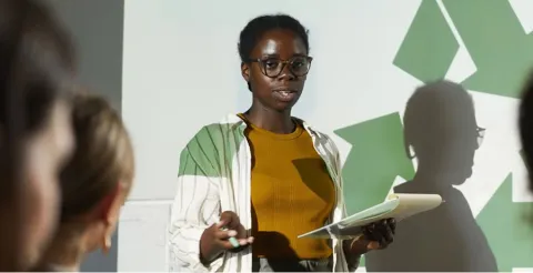 Teacher presenting to students in classroom